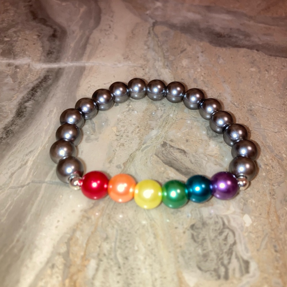 Rainbow glass PRIDE gray bracelet: 6”-6 1/4”wrist. Double glued/hidden knot.